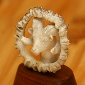 Click to see a larger image of this Carved Antler Ram Head
